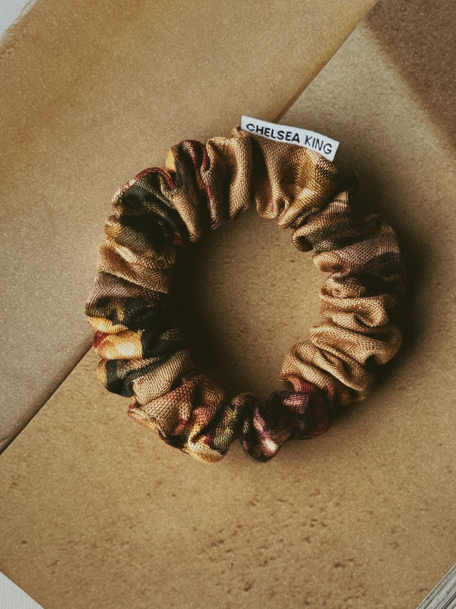 floral jacquard with a brand tag on a brown background